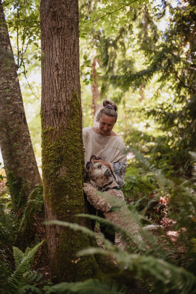 Livia and her dog in the forest